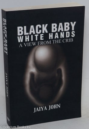 Black baby White Hands; a view from the crib
