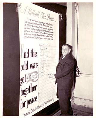 Cat.No: 145675 Photograph of John Howard Lawson signing 'A Rollcall for Peace...' for the...