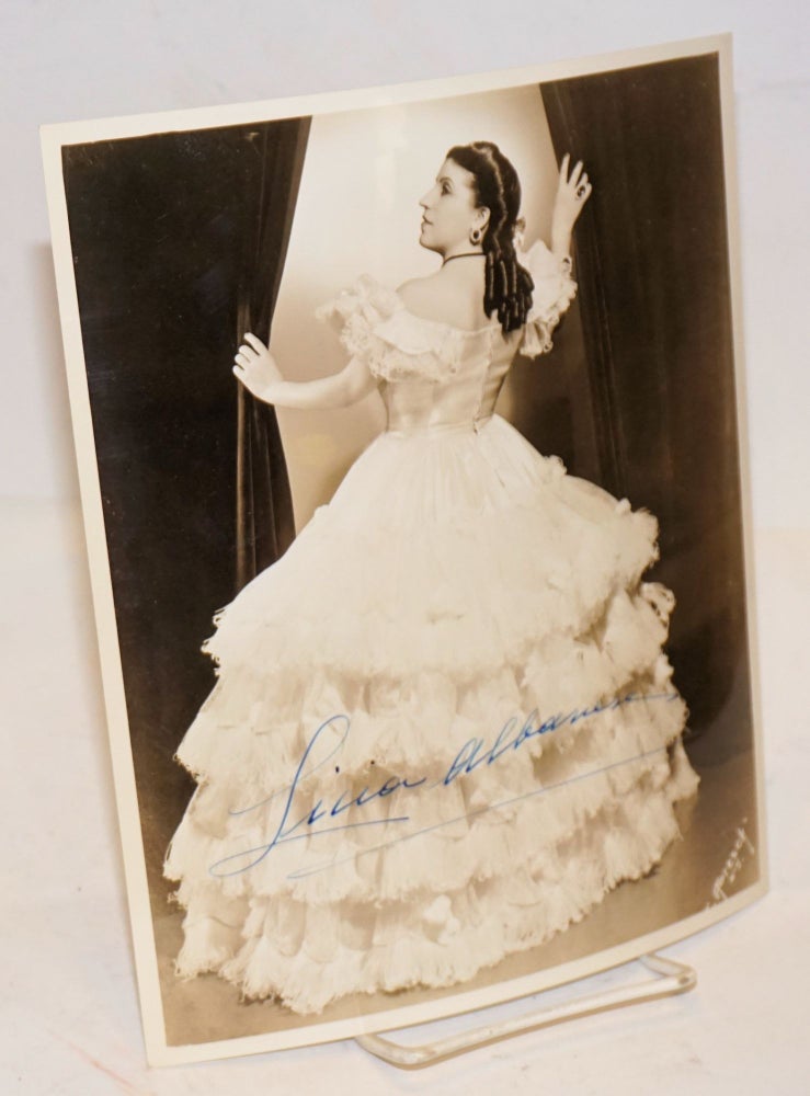 Cat.No: 198286 8x10 sepia photograph of Licia Albanese as Violetta in "La Traviata," signed. J. photographer Abesch, Licia Albanese.