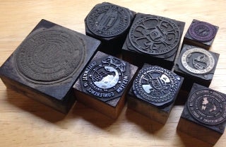Cat.No: 201573 [Eight union seals mounted on wooden blocks for use in a print shop