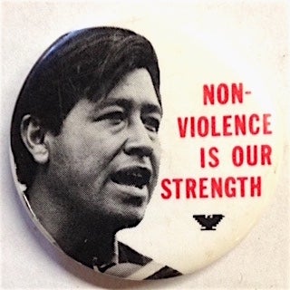 Cat.No: 204473 Non-violence is our strength [pinback button]. Cesar Chavez United Farm Workers.