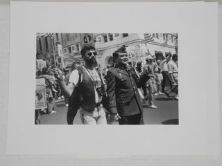 Seven glossy b&w photographs of gay pride events