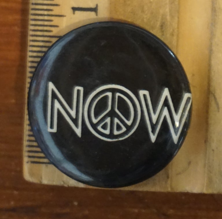 Cat.No: 207574 Now [pinback button with peace sign in the "o"]