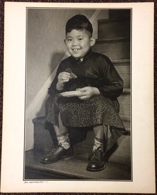 All American Boy [large photo print of a Chinese-American boy eating on the stairs]
