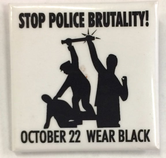 Cat.No: 245838 Stop police brutality! October 22 Wear Black [pinback button]. October 22 Coalition to Stop Police Brutality.