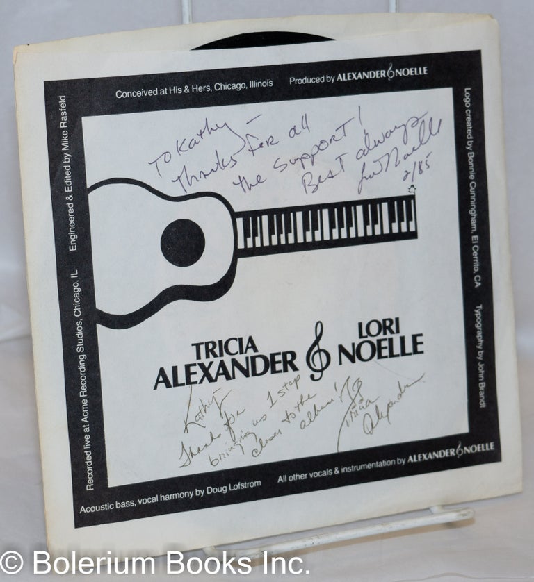 Cat.No: 270721 Tricia Alexander & Lori Noelle [45rpm vinyl record] Side A: Woodstock by Joni Mitchell; Side B: Here We Go Again by Alexander & Noelle [inscribed & signed by both artists]. Tricia Alexander, Lori Noelle.