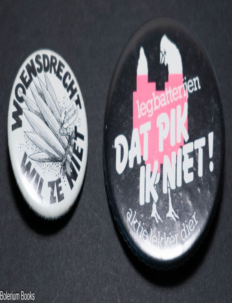 Two Dutch activist pinback buttons