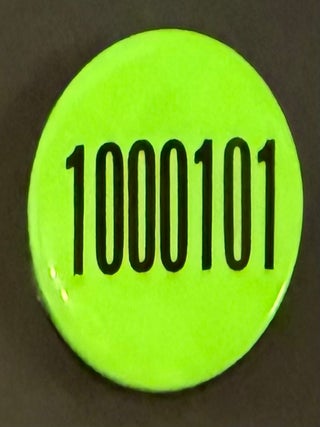 Cat.No: 346075 1000101 [pinback button featuring the binary code for "69"