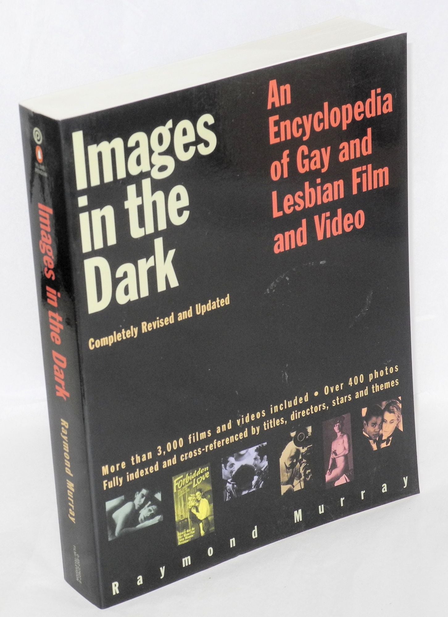 Images in the Dark: an encyclopedia of gay and lesbian film and video by  Raymond Murray on Bolerium Books